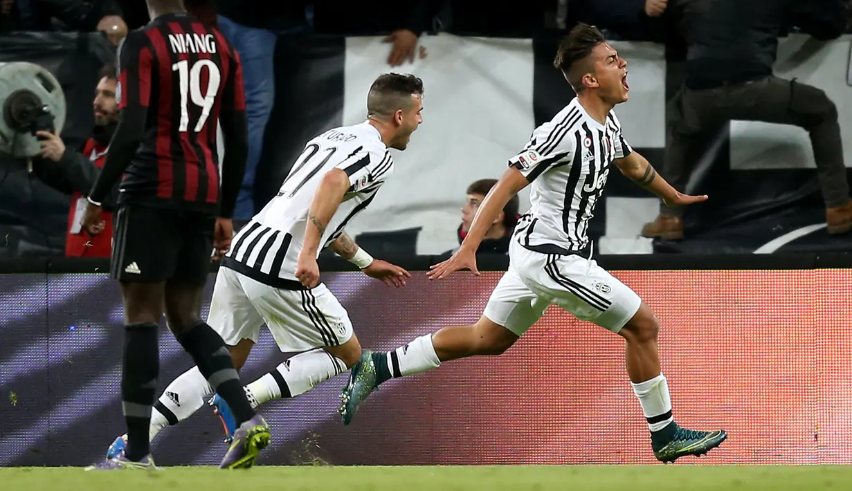 Ekspresi pemain Juventus, Paulo Dybala, setelah mencetak gol ke gawang AC Milan dalam lanjutan Serie A Italia di Stadion Juventus, Minggu (22/11/2015) dini hari WIB. (AFP Photo/Marco Bertorello)