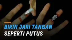 Karya kreatif diperlihatkan oleh seseorang ketika membuat jari tangan seperti putus.