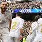 Karim Benzema mencetak gol tunggal kemenangan Real Madrid atas Atletico Madrid pada laga pekan ke-22 La Liga Spanyol di Santiago Bernabeu, Sabtu (1/2/2020). (AFP/PIERRE-PHILIPPE MARCOU)