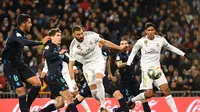 Karim Benzema berhasil cetak gol untuk Real Madrid saat lawan Sociedad (PIERRE-PHILIPPE MARCOU / AFP)