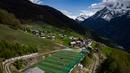 Suasana Stadion Ottmar Hitzfeld di tengah pegunungan Alpen Swiss (14/5/2020). Markas klub FC Gspon tersebut berada  pada ketinggian 2.000 meter di atas permukaan laut. (AFP/Fabrice Coffrini)