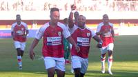 Selebrasi gol Persipura yang dicetak Muhammad Tahir ke gawang PSS di Stadion Maguwoharjo, Sleman (19/9/2019). (Bola.com/Vincentius Atmaja)
