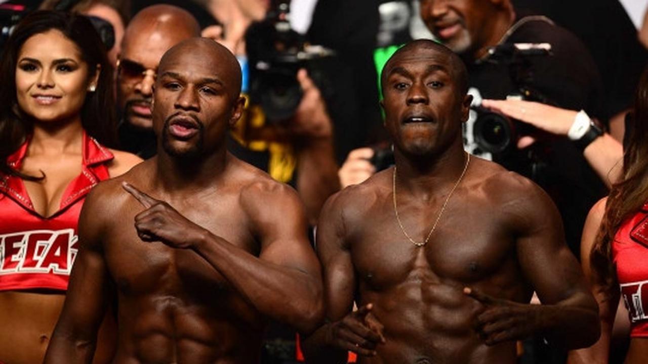 Jelang pertarungan, Mayweather dan Berto saling tatap