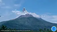 Gunung Lewotobi Laki-laki, Nusa Tenggara Timur pada tanggal 21 Januari 2024 pukul 12.49 WITA dengan tinggi kolom abu teramati ± 700 m di atas puncak (± 2.284 m di atas permukaan laut). (sumber foto : Humas Badan Geologi)'