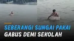 Penuh perjuangan perjalanan seorang bocah laki-laki ini ketika pergi sekolah. Karena harus menggunakan kotak gabus untuk menyeberangi sungai.