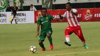 Persebaya dalam laga uji coba melawan Sarawak FA di Stadion Gelora Bung Tomo, Minggu (18/3/2018). (Bola.com/Aditya Wany)
