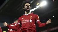 Pemain Liverpool, Mohamed Salah merayakan gol usai membobol gawang Leicester City pada lanjutan Premier League di Anfield, Liverpool, (30/12/2017).  Liverpool menang 2-0. (Peter Byrne/PA via AP)