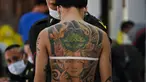 Seorang pria muda menjalani pemeriksaan fisik selama wajib militer tahunan di Bangkok (23/7/2020). (AFP Photo/Lillian Suwanrumpha)