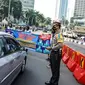 Aturan ganjil genap Jakarta berlaku hari ini, Jumat (23/8/2024). (Liputan6.com/Faizal Fanani)