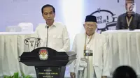 Pasangan capres-cawapres Joko Widodo (kiri) dan Ma'ruf Amin (kanan) memberikan pidato usai mengambil nomor urut peserta Pemilu 2019 di Kantor KPU, Jakarta, Jumat (21/9). Pasangan Jokowi-Ma'ruf mendapatkan nomor urut 01. (Liputan6.com/Faizal Fanani)
