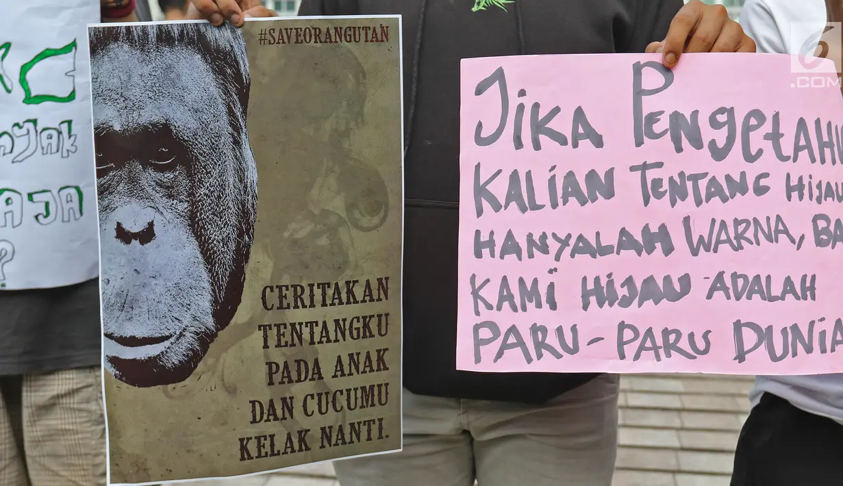 Masyarakat yang tergabung dalam organisasi LGN Jakarta melakukan aksi saat CFD di Bundaran HI, Jakarta, Minggu (29/9/2019). Aksi tersebut sebagai bentuk protes kepada pihak terkait untuk menuntaskan bencana kebakaran hutan yang terjadi di sejumlah wilayah di Indonesia. (Liputan6.com/Herman Zakharia)