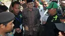 Ketua Umum PPP Suryadharma Ali tiba di lokasi Mukernas III PPP di Cisarua, Bogor, Kamis (24/4/14). (Liputan6.com/Johan Tallo)