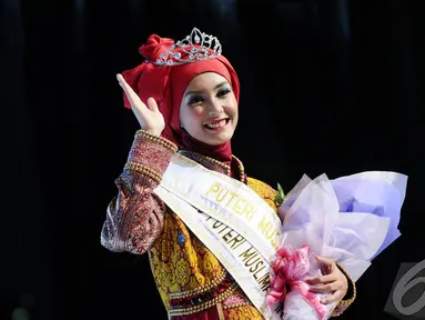 Siti Nurmelia Baskarani (19) menjadi pemenang pada ajang pencarian bakat Putri Muslimah Indonesia 2014,  Rabu (28/5/2014) (Liputan 6.com/Andrian M Tunay)