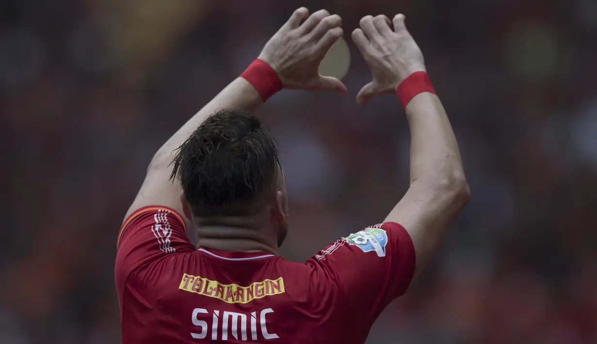 Striker Persija Jakarta, Marko Simic, merayakan gol yang dicetaknya ke gawang Mitra Kukar pada laga Liga 1 di SUGBK, Jakarta, Minggu (9/12). (Bola.com/Yoppy Renato)