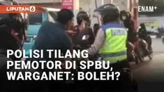 Seorang pemotor tak berhelm didatangi polisi di momen yang tak terduga. Pemotor tersebut ditilang saat mengantri di SPBU. Viralnya video tersebut mengundang tanya warganet.