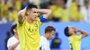 Cristiano Ronaldo masih belum bisa memberikan gelar juara bergengsi untuk klub Arab Saudi Al Nassr. Terbaru Al Nassr kalah 0-1 dari klub Jepang Gamba Osaka di final AFC Champions League 2 atau Liga Champions Asia 2 (ACL 2) pada Minggu (17/5/2026) dini hari WIB. (AFP/Fayez Nureldine)