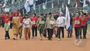 Aksi teaterikal para buruh saat perayaan hari buruh sedunia (May Day), SGBK, Jakarta, Jumat (1/5/2015). Mereka menuntut melawan kebijakan upah murah dan kenaikan upah setiap lima tahun sekali. (Liputan6.com/Herman Zakharia)
