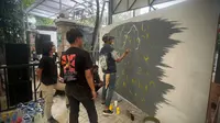 Kompetisi mural digelardi Rumah Aspirasi Pemenangan Ganjar Pranowo, Jakarta, Sabtu (2/9/2023). (Foto:Liputan6/Nanda Perdana Putra)