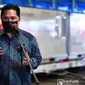 Menteri BUMN sekaligus Ketua Pelaksana KPC-PEN Erick Thohir menyambut kedatangan bahan baku vaksin Sinovac di Bandara Soekarno-Hatta, Tangerang, Banten, Senin (31/5/2021). (Dok Kementerian Komunikasi dan Informatika)
