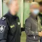 Polisi Australia merilis foto petugas mengawal bandar narkoba 'El Chapo' Asia, Tse Chi Lop melalui bandara Melbourne.(Australia Federal Police)