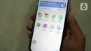 Warga menunjukkan aplikasi SatuSehat Mobile di Jakarta, Rabu (1/3/2023). Pengguna iOS dan Android sudah mulai bisa menemukan aplikasi SatuSehat Mobile di perangkatnya, maupun dengan melakukan update di toko aplikasi. (Liputan6.com/Herman Zakharia)