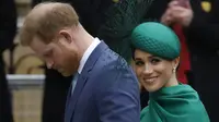 Meghan Markle dan Pangeran Harry saat hadir di Commonwealth Day Service 2020 di Westminster Abbey. (TOLGA AKMEN / AFP)