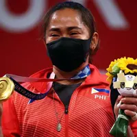 Hidilyn Diaz, atlet angkat besi Filipina cetak sejarah usai menyabet medali emas pertama untuk Filipina dalam ajang olimpiade. (FOTO:Instagram/christianreynera).