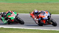 Pebalap Ducati, Andrea Dovizioso, menjadi yang tercepat pada sesi latihan bebas kedua (FP2) MotoGP San Marino yang berlangsung di Sirkuit Misano World Circuit Marco Simoncelli. (AFP/Tiziana Fabi)