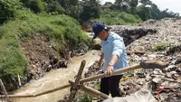 Terungkap Biang Kerok Banjir Sawangan-Cipayung: Gunungan Sampah Longsor ke Kali