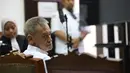Musisi sekaligus penyanyi, Fariz Roestam Moenaf alias Fariz RM saat mengikuti sidang pembacaan tuntutan oleh Jaksa Penuntut Umum (JPU) di Pengadilan Negeri Jakarta Selatan pada Senin (4/8/2025). (KapanLagi.com/Budy Santoso)
