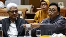 Kepala Badan Tenaga Nuklir Nasional (Batan), Anhar Riza Antariksawan (kanan) mengikuti Rapat Dengar Pendapat (RDP) dengan Komisi VII DPR di Kompleks Parlemen, Jakarta, Kamis (20/2/2020). Rapat membahas temuan radiasi radioaktif di Perumahan Batan Indah, Tangerang Selatan. (Liputan6.com/Johan Tallo)