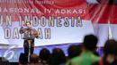Presiden Joko Widodo memberikan kata sambutan dalam Musyawarah Nasional IV Adkasi di Jakarta, Kamis (17/12). Musyawarah nasional ini bertema 'Membangun Indonesia Dari Daerah' dengan dihadiri DPRD Kabupaten seluruh Indonesia. (Liputan6.com/Faisal R Syam)