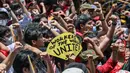 Peringatan May Day menjadi momen penting bagi para pekerja di seluruh dunia untuk menyuarakan hak-hak mereka, termasuk di Indonesia. Tampak dalam foto, orang-orang meneriakkan slogan-slogan dalam demonstrasi Hari Buruh di Manila pada tanggal 1 Mei 2025. (Jam STA ROSA/AFP)