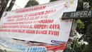 Spanduk pengumuman terpampang di Jalan Ampera, Jakarta, Selasa (7/8). Jalan Taman Margasatwa Ragunan, Margasatwa Barat, Cilandak KKO, dan Ampera akan ditutup saat pelaksanaan Api Obor Asian Games 2018 pada 15 Agustus. (Liputan6.com/Herman Zakharia)