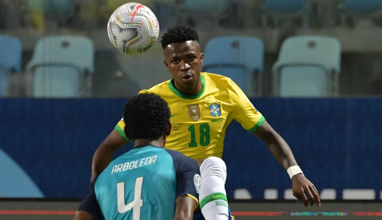 Rekan senegara Neymar, Vinicius Jr juga berhasil membawa Brasil lolos ke putaran final Piala Dunia 2022. Pemain berbanderol Rp1,6 Triliun juga mampu tampil cemerlang sebagai penyerang Real Madrid pada musim ini. (AFP/Nelson Almeida)