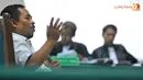 Saat di persidangan, Luthfi mengaku pernah membahas fee pengadaan kuota impor daging sapi dengan Ahmad Fathanah (Liputan6.com/ Abdul Aziz Prastowo).