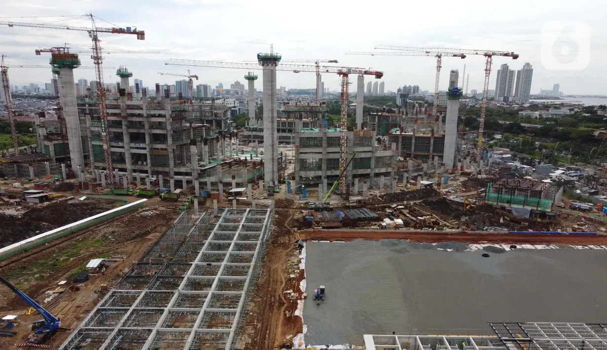 Foto udara perkembangan pembangunan Jakarta International Stadium, Jumat (23/10/2020). Hingga pekan ke-59, progres konstruksi Jakarta International Stadium sudah mencapai 31,89 persen dan ditarget akan selesai pada akhir 2021. (Liputan6.comHelmi Fithriansyah)