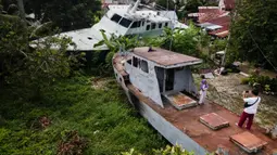 Gempa tersebut memicu tsunami besar di wilayah pesisir Sumatera, Indonesia menewaskan ratusan ribu orang di belasan negara. (Yasuyoshi CHIBA/AFP)