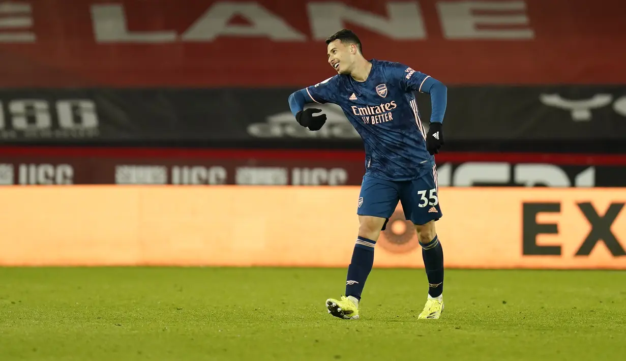 Penyerang Arsenal, Gabriel Martinelli berselebrasi setelah mencetak gol ke gawang Sheffield United pada pertandingan lanjutan Liga Inggris di stadion Bramall Lane di Sheffield, Inggris, Senin (12/4/2021). Arsenal menang telak atas Sheffield United 3-0. (AP Photo/Tim Keeton, Pool)