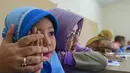 Program ini menargetkan sebanyak 53,8 juta peserta didik di seluruh Indonesia. (Merdeka.com/Arie Basuki)