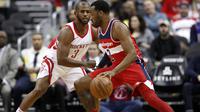 Chris Paul tampil untuk Houston Rocket tapi tetap kalah dari Wizards (AP Photo/Alex Brandon)