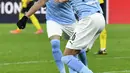 Gelandang Manchester City, Riyad Mahrez berselebrasi usai mencetak gol ke gawang Borrusia Dortmund pada pertandingan leg kedua perempat final Liga Champions di stadion Signal Iduna Park di Dortmund, Jerman, Kamis (15/4/2021). City menang atas Dortmund 2-1. (AP Photo/Martin Meissner)