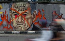 FOTO: Protes Genosida Israel, Mural Netanyahu Pembunuh Anak-Anak Hiasi Sudut Jakarta