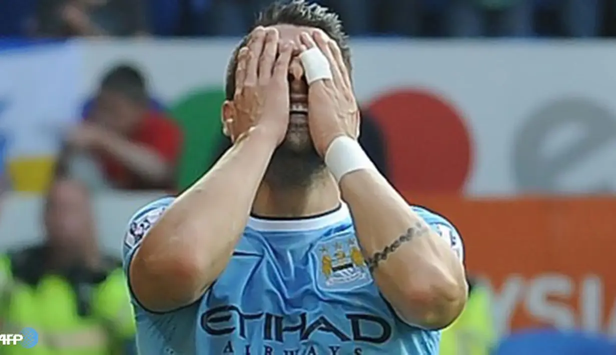 Ekspresi Alvaro Negredo pada pertandingan Liga Inggris antara Cardiff City melawan Manchester City di Stadion Cardiff City, Cardiff Minggu 25 Agustus 2013. (AFP/Andrew Yates)