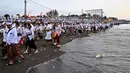 Upacara Melasti merupakan salah satu ritual penyucian bagi umat Hindu Bali yang diadakan sebelum Hari Raya Nyepi. (Sonny TUMBELAKA/AFP)