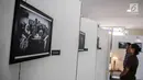 Sebuah karya foto terlihat dalam pameran fotografi di Kampus Universitas Budi Luhur, Jakarta, Jumat (27/10). Pameran fotografi ini bercerita tentang ungkapan kegelisahan seseorang terhadap keluarga yang membesarkannya. (Liputan6.com/Angga Yuniar)