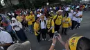 Ratusan massa pendukung perbaikan KPK-Polri berkumpul di Bundaran HI Jakarta, Minggu (22/2/2015). (Liputan6.com/Faizal Fanani)