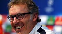 Pelatih PSG, Laurent Blanc, optimistis membawa timnya mengalahkan Manchester City pada laga leg kedua babak perempat final Liga Champions, Selasa (12/4/2016). (EPA/Nigel Roddis)