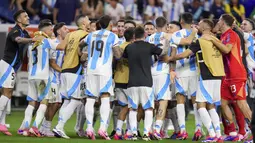 Berkat kemenangan tersebut, Timnas Argentina melenggang ke semifinal Copa America 2024. Pada babak empat besar, La Albiceleste bakal meladeni pemenang antara Venezuela kontra Kanada. (AP Photo/Julio Cortez)