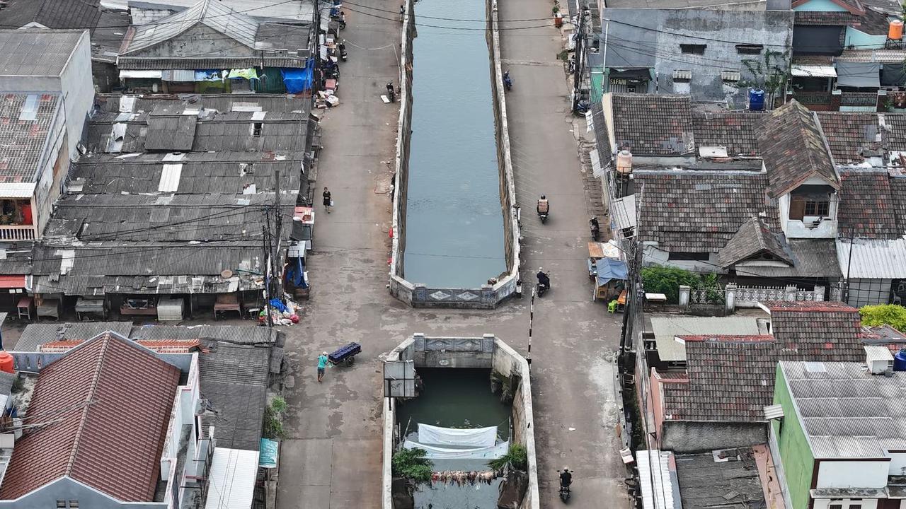 Cara Cepat Pemkot Tangsel Bereskan  Banjir di Kali Serua